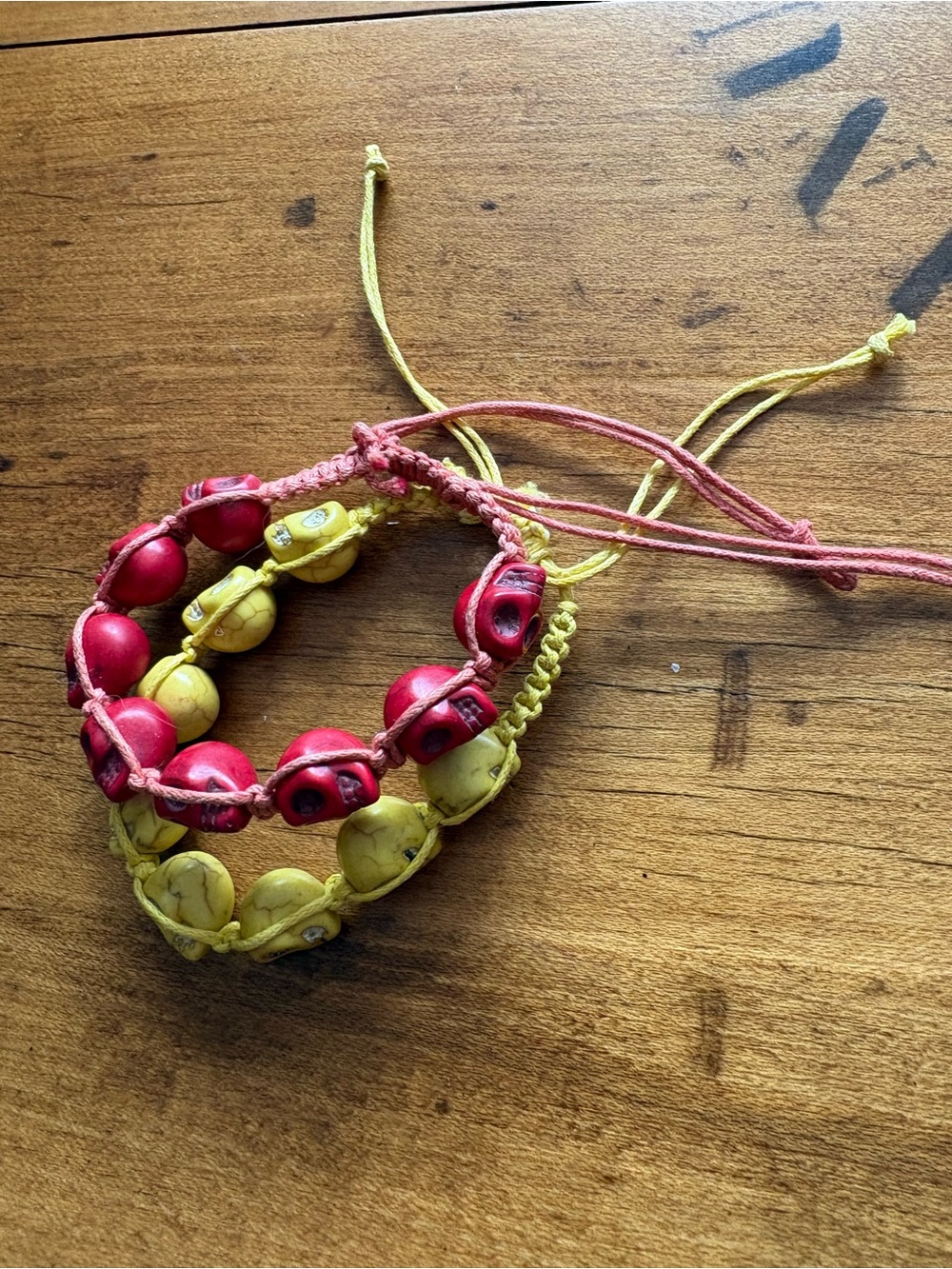 2 Adjustable Beaded Skull Bracelets - Yellow and Red